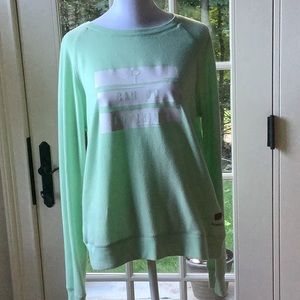 Peace love World top  Crew neck,green,long sleeves. Size XS/S